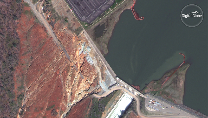 A closer view of the auxiliary spillway and the damage done. (Image: DigitalGlobe)